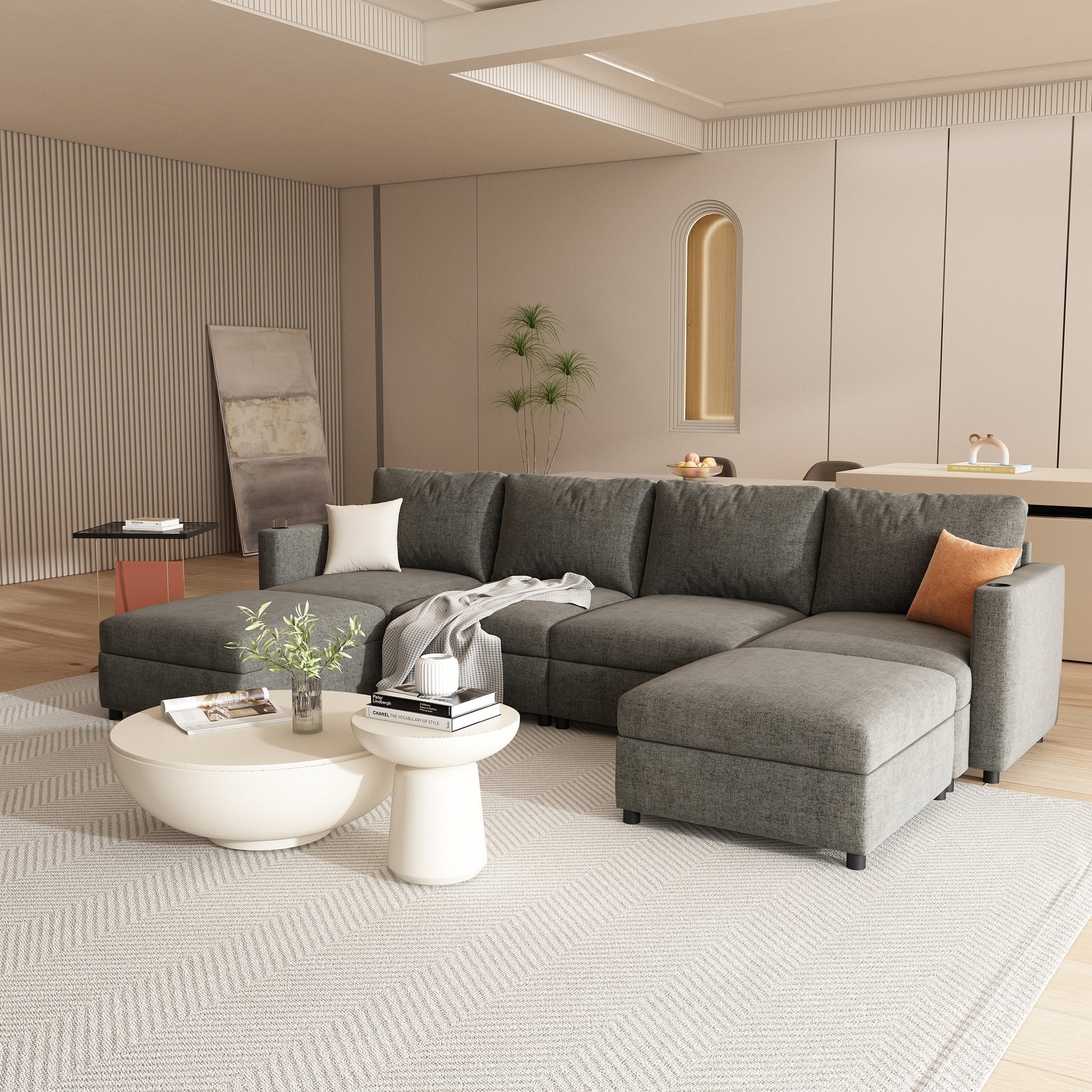 Dark grey sectional sofa with chaise lounge in a modern living room setting