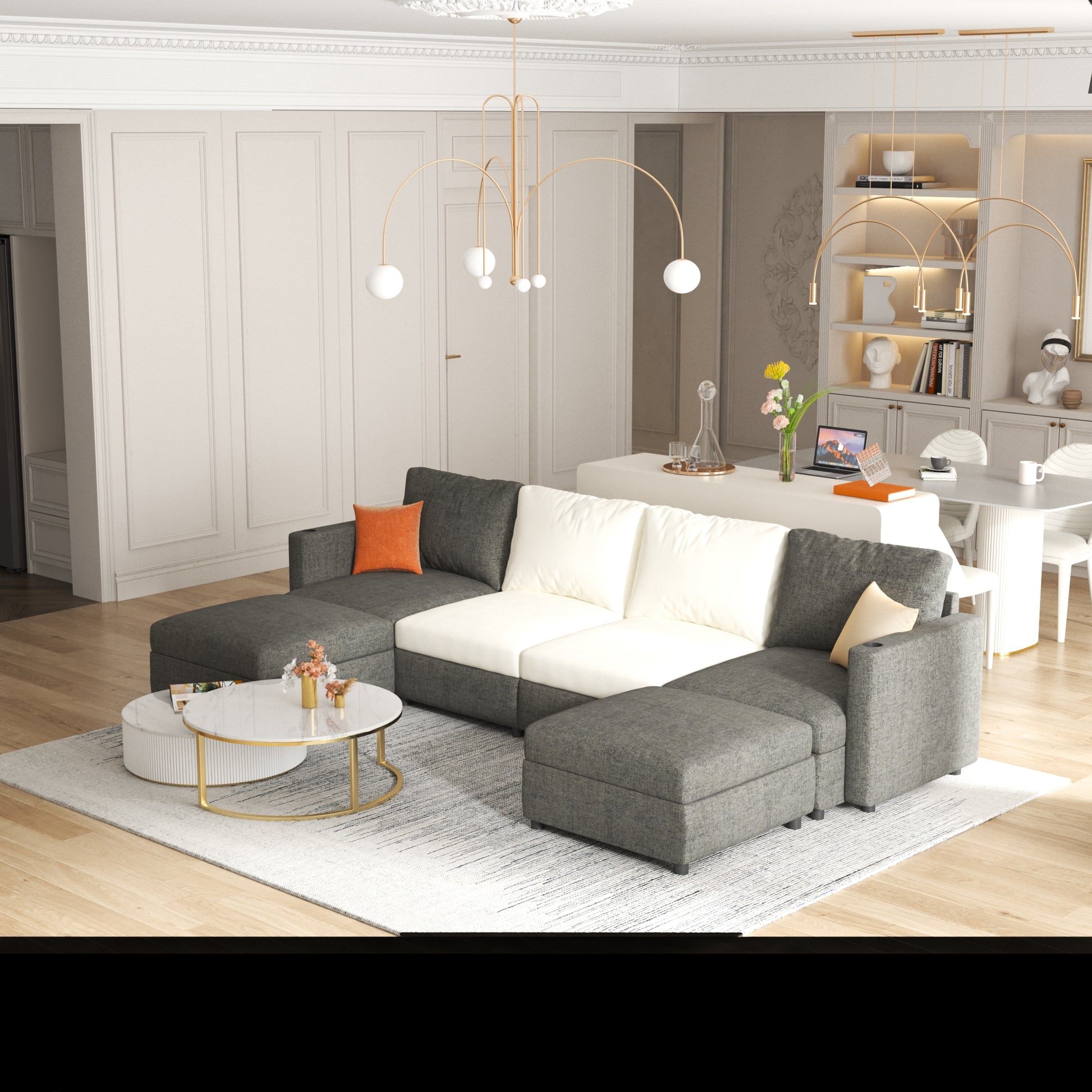 Dark gray sectional sofa with white cushions and an orange throw pillow