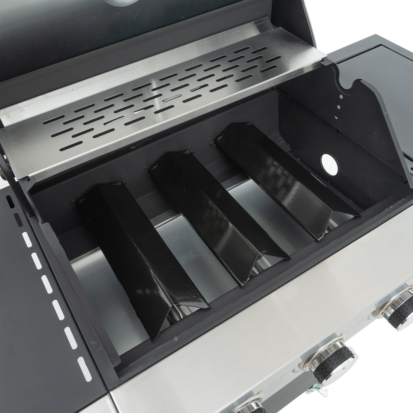 Closeup of stainless steel gas grill burners four black flavorizer bars visible