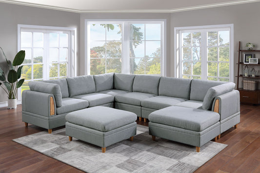Gray fabric sectional sofa with wooden arm accents and matching ottomans for living room seating