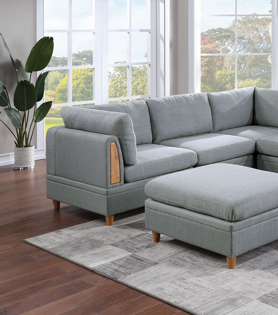 Modern gray sectional sofa with light wood arm accent and matching ottoman