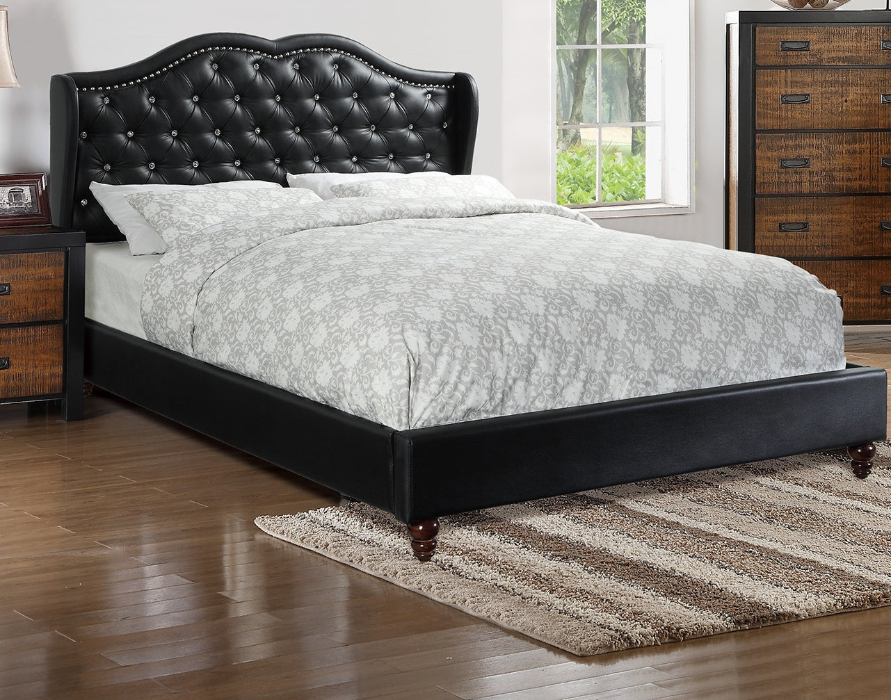 Black faux leather tufted wingback bed frame with silver crystal buttons