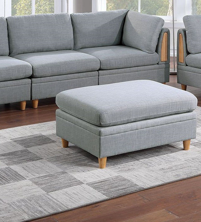 Light gray fabric storage ottoman with wooden legs perfect for living rooms