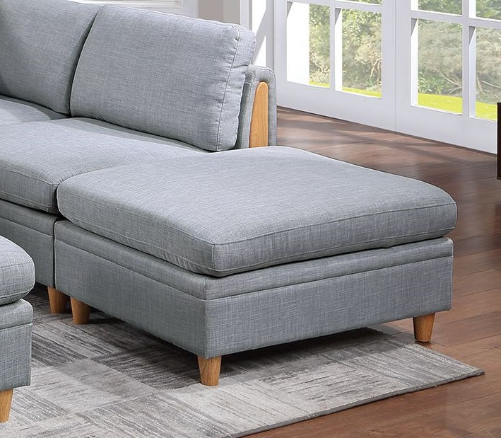 Light gray fabric storage ottoman with wooden legs perfect for living rooms