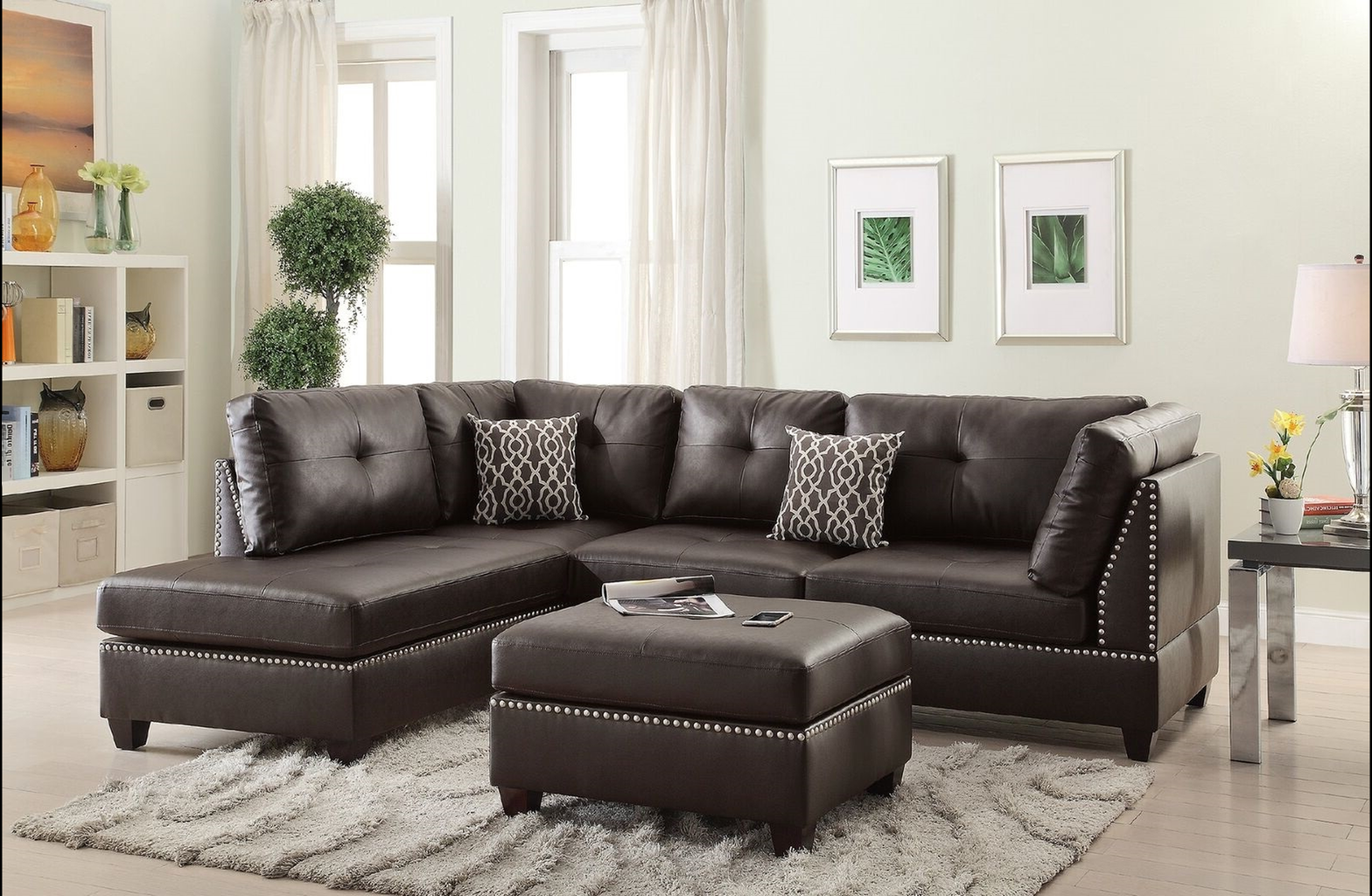 Dark brown faux leather sectional sofa with tufted cushions and silver nailhead trim Primary keyword faux leather sectional