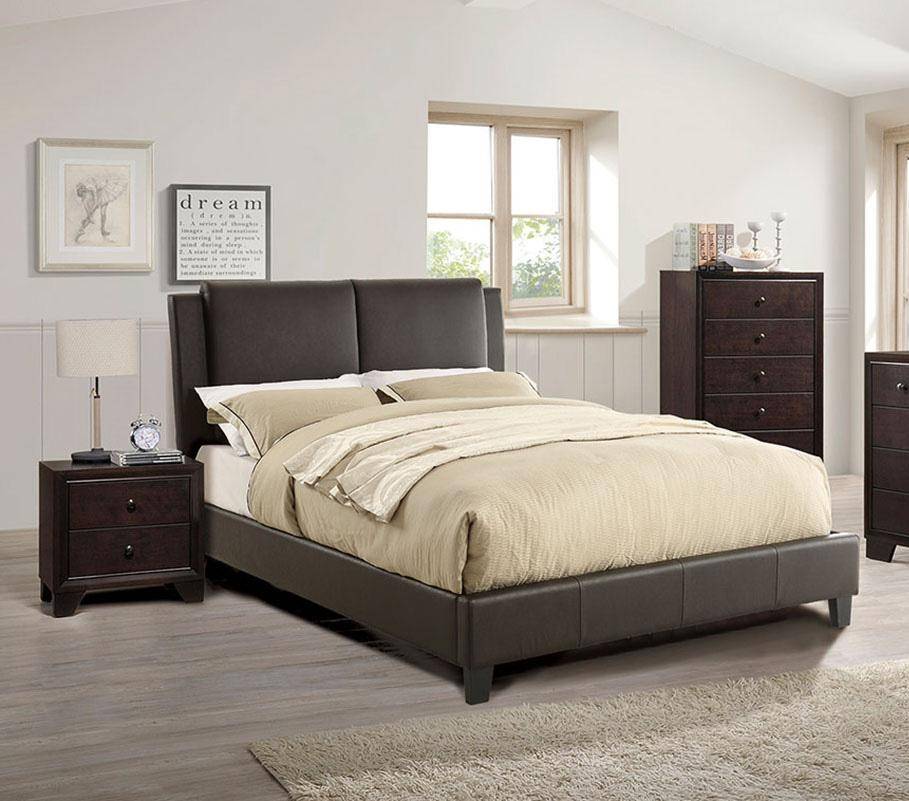 Dark brown leather king size bed with plush beige bedding and two matching nightstands