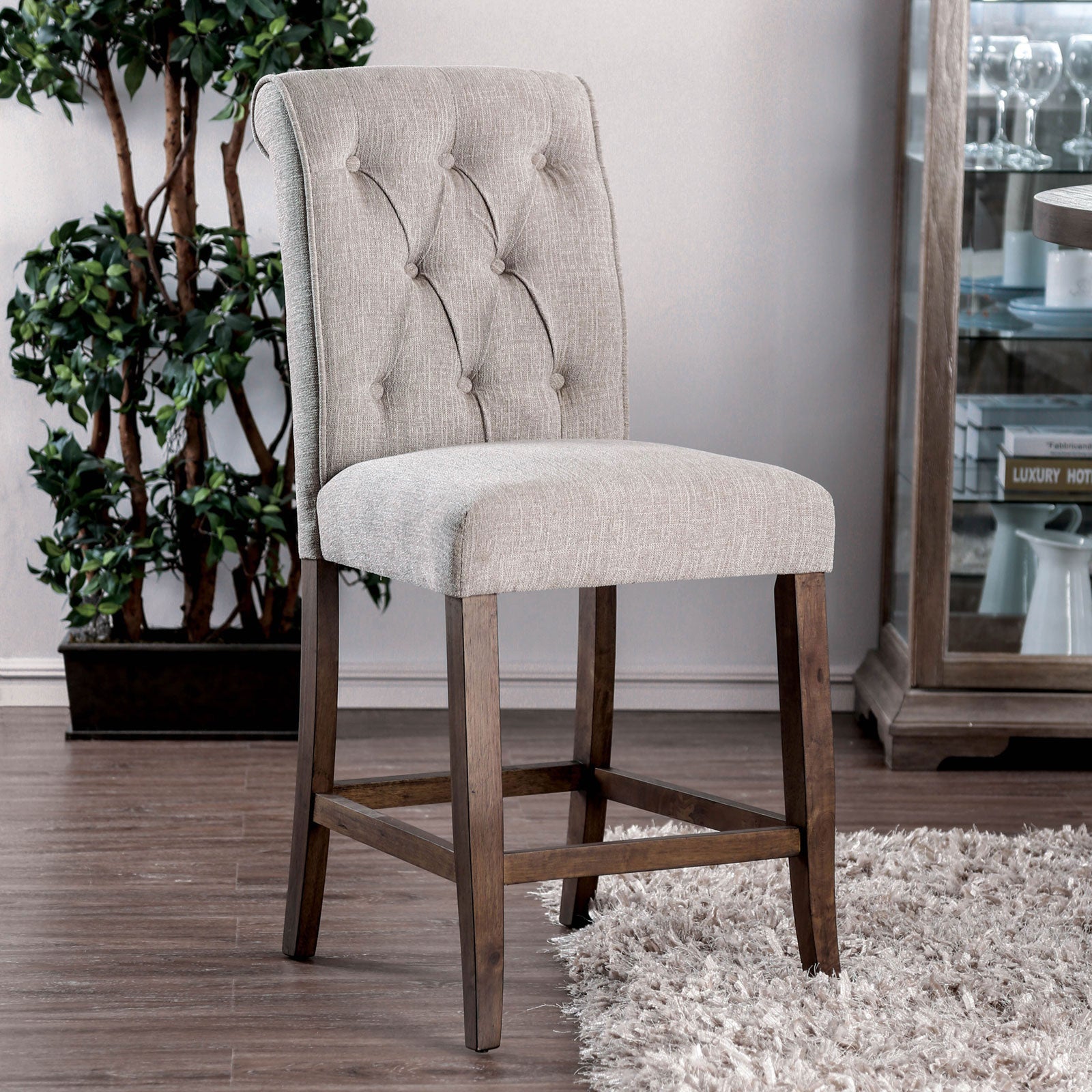 Tufted back linen counter stool with wooden legs