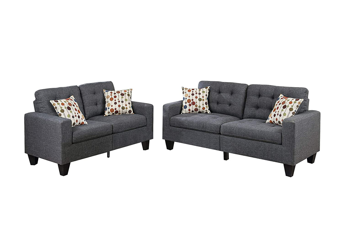 Dark gray upholstered seater sofa with tufted back and decorative pillows