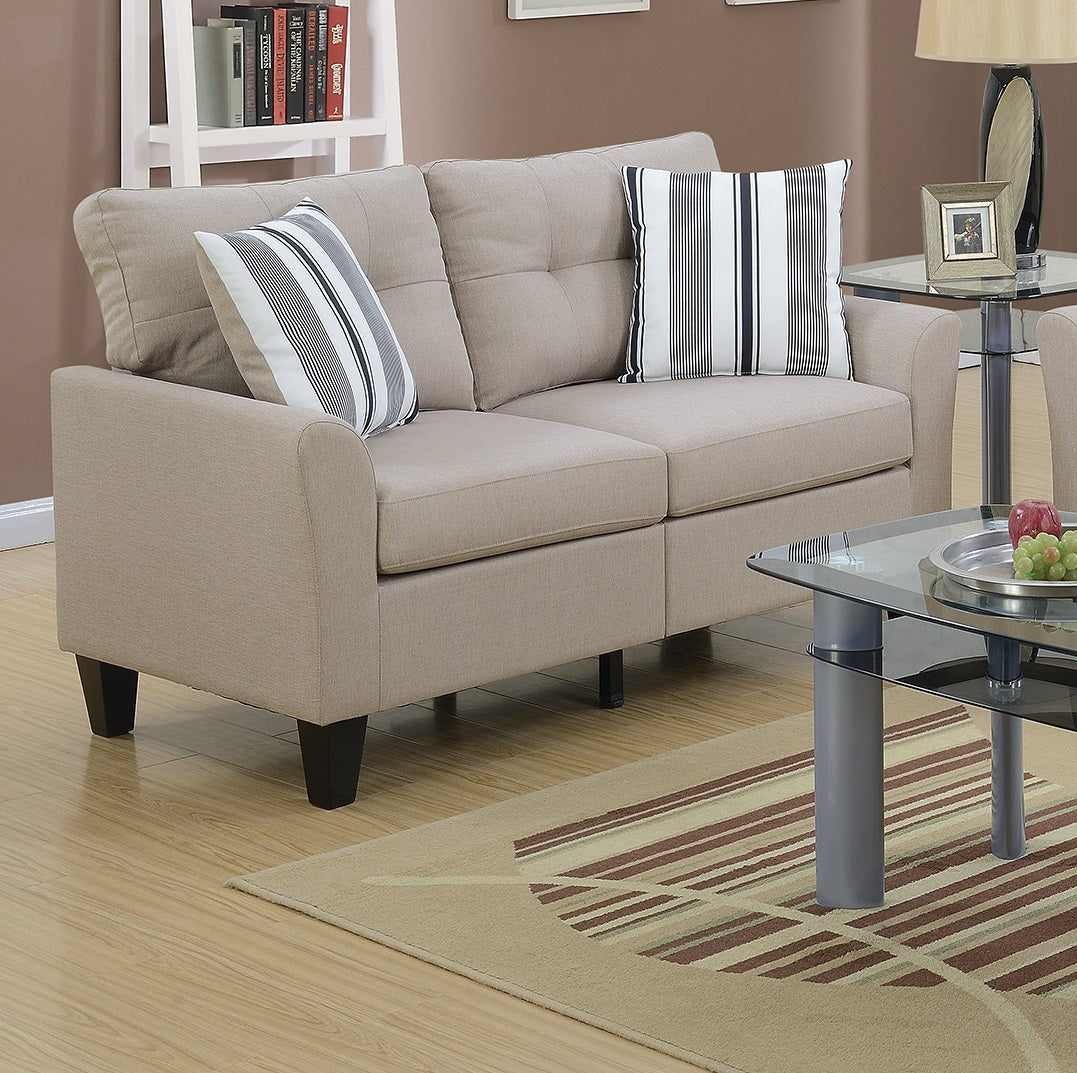 Beige fabric loveseat with tufted back and striped throw pillows for cozy living room seating