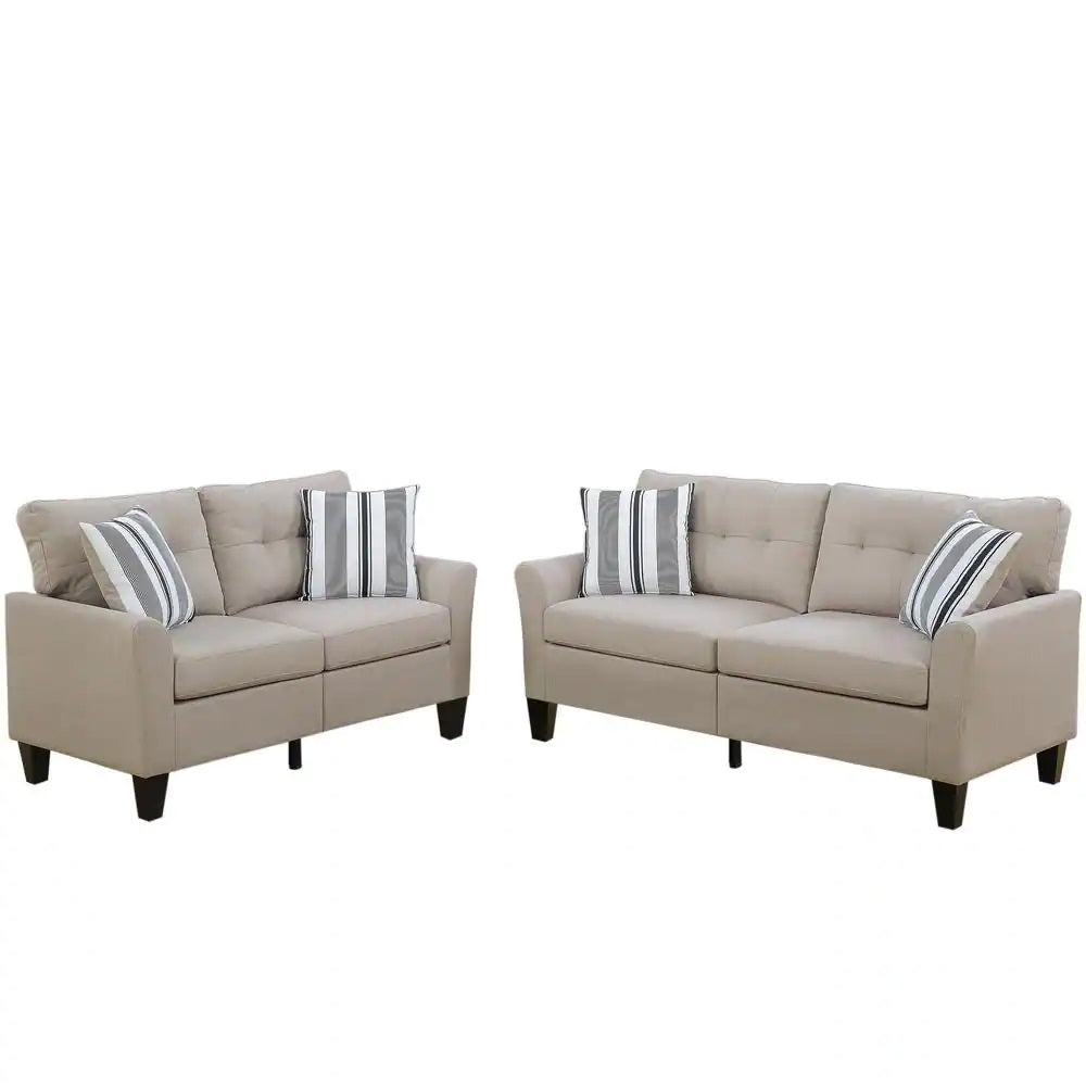 Taupe twoseater sofa with plush cushions and striped accent pillows for living room comfort