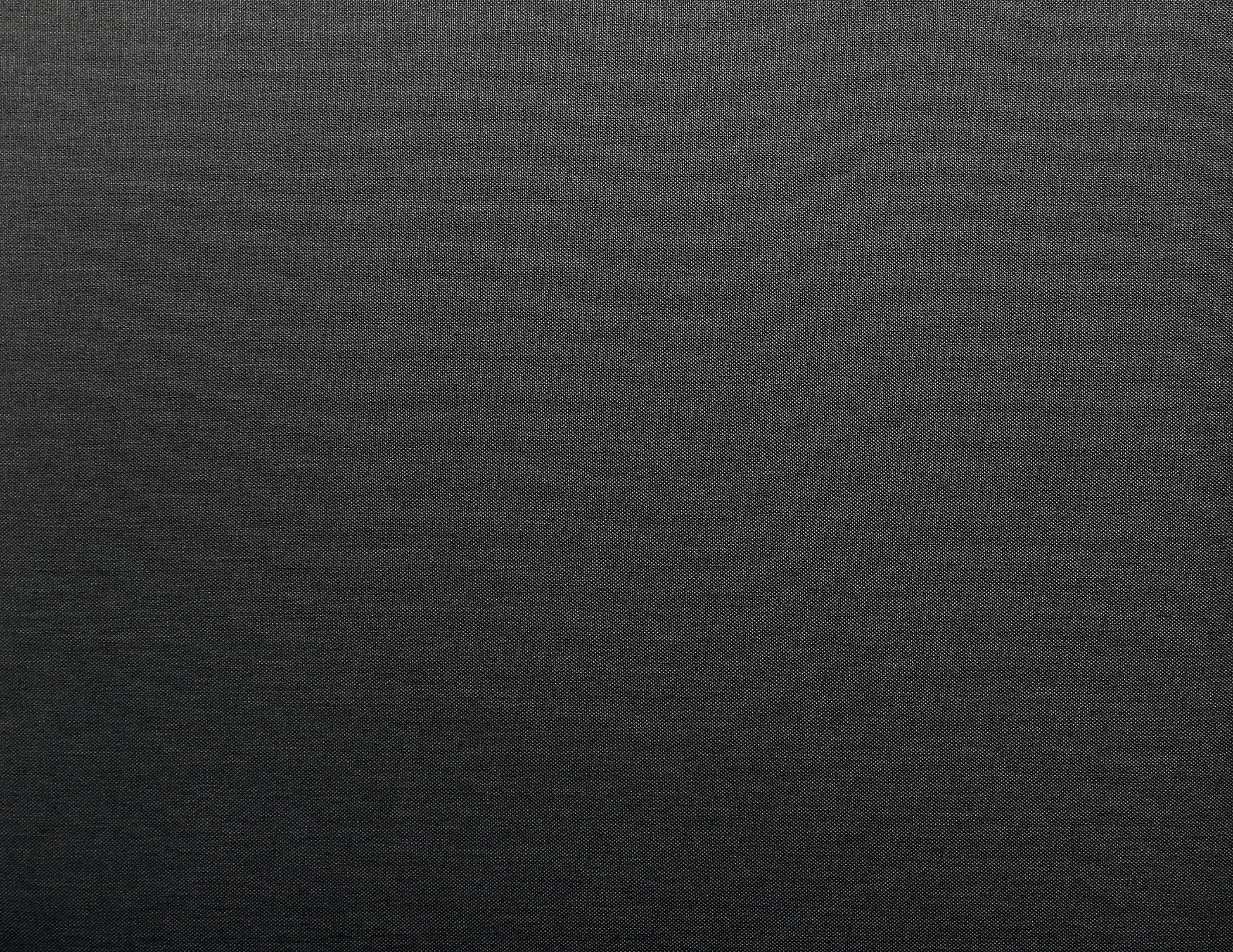 Dark grey textured fabric background perfect for upholstery and textile projects