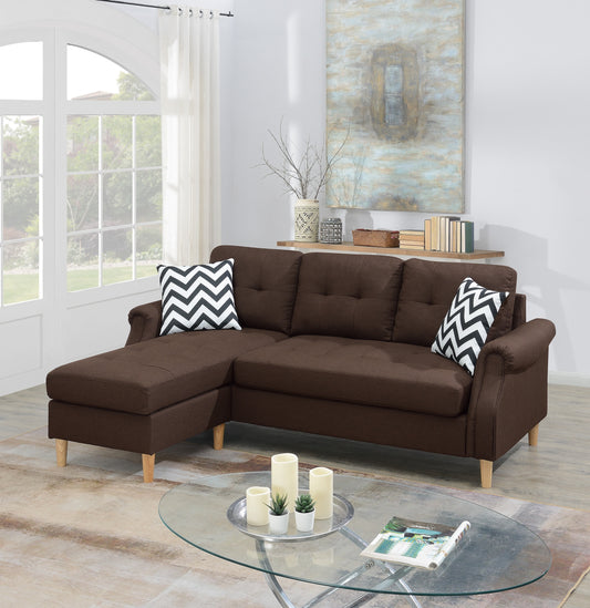 Brown tufted fabric sectional sofa with chaise and chevron pillows