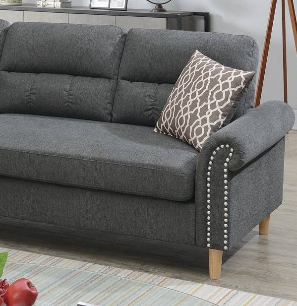 Dark grey fabric sofa with rolled arm and decorative nailhead trim accent