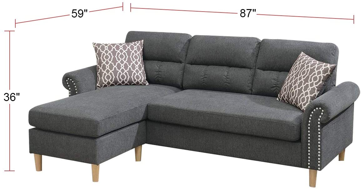Dark grey fabric sectional sofa with studded armrests and modern design