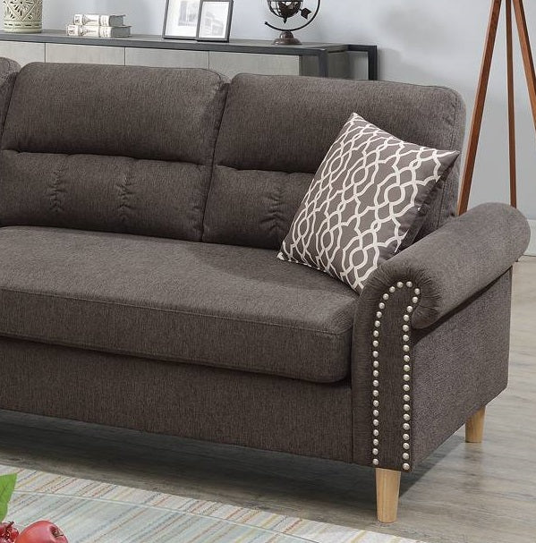 Dark gray fabric sofa with rolled arms and decorative nailhead trim