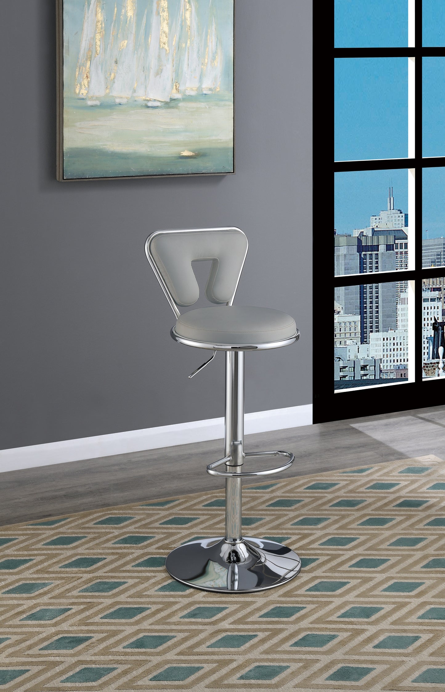 Sleek gray upholstered bar stool with adjustable height and chrome accents