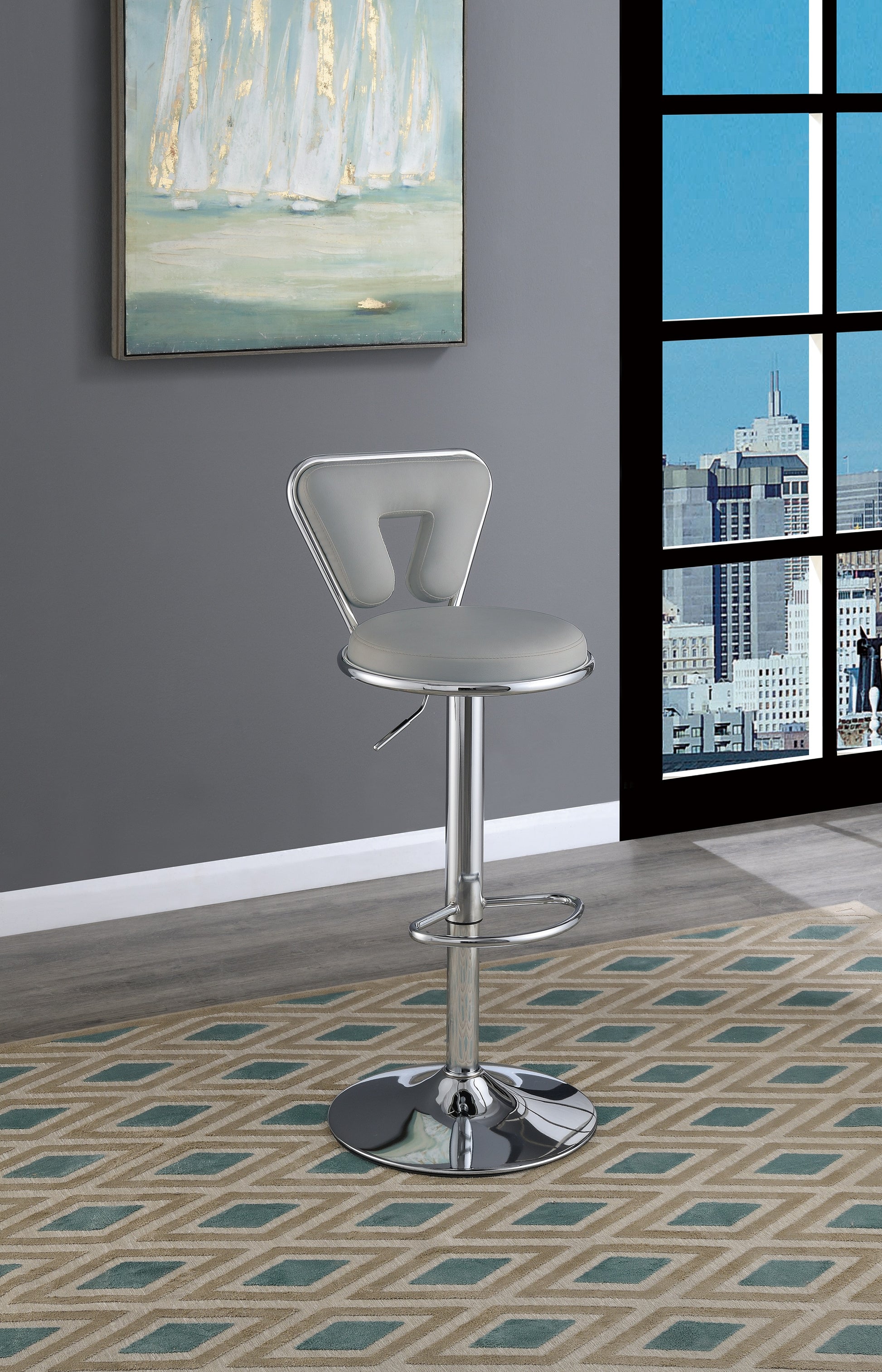 Sleek gray upholstered bar stool with adjustable height and chrome accents