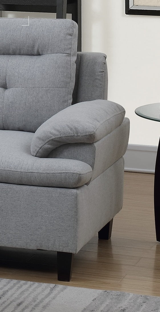 Gray fabric sectional sofa armrest with tufted cushions