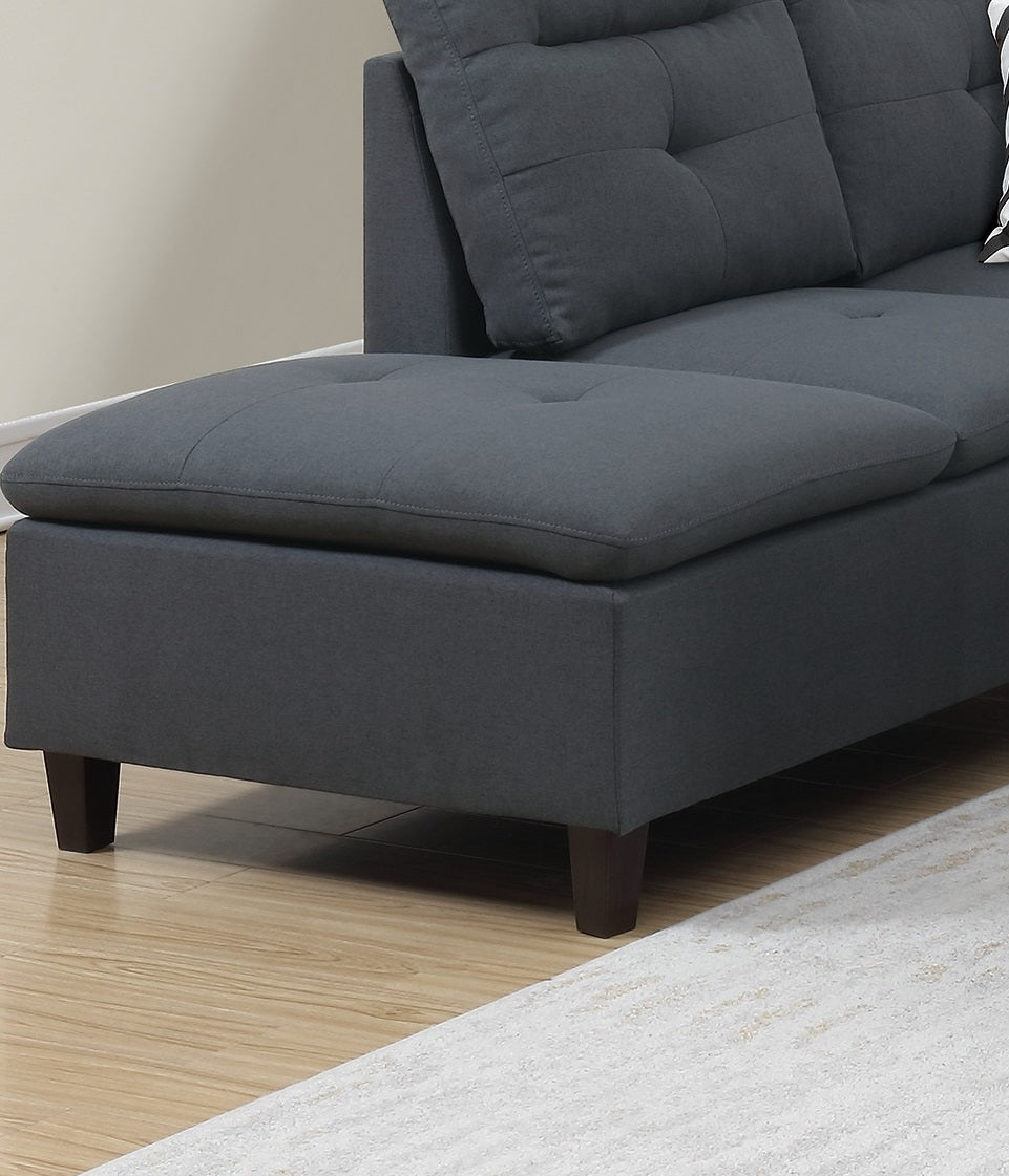 Dark gray fabric sectional sofa with tufted chaise lounge and wooden legs