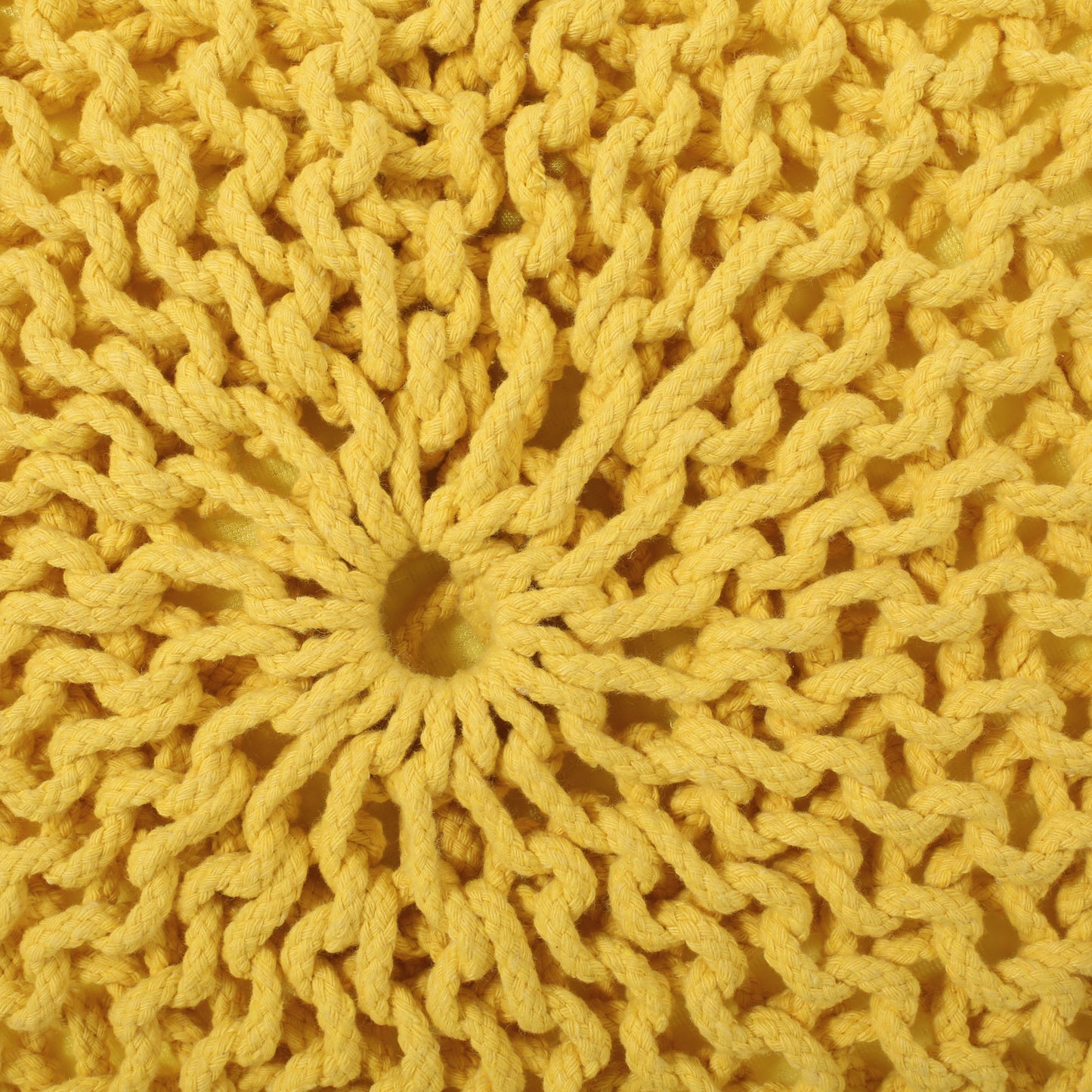 Yellow chunky knit pouf cushion with braided rope texture