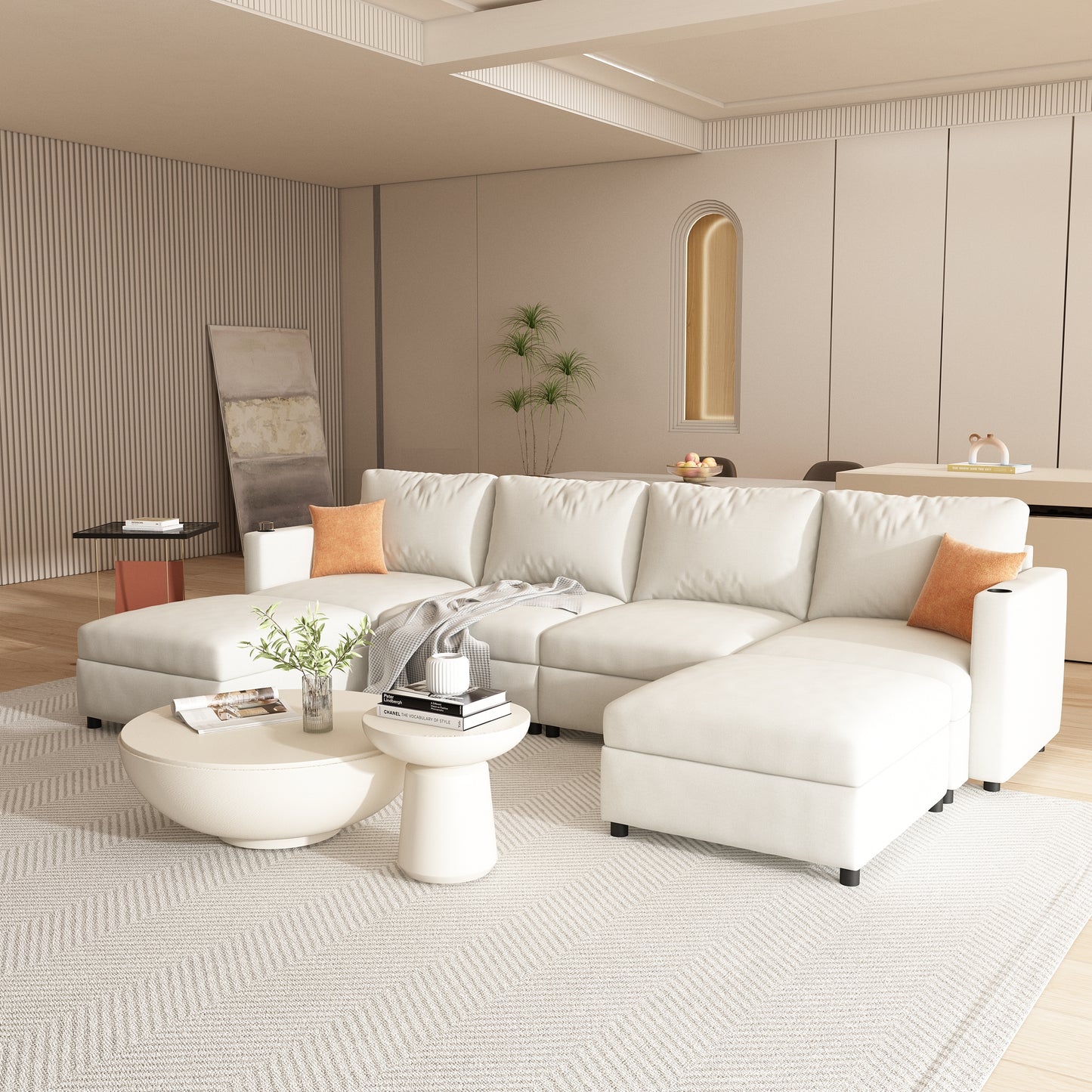 Spacious white modular sectional sofa with plush cushions and orange accent pillows