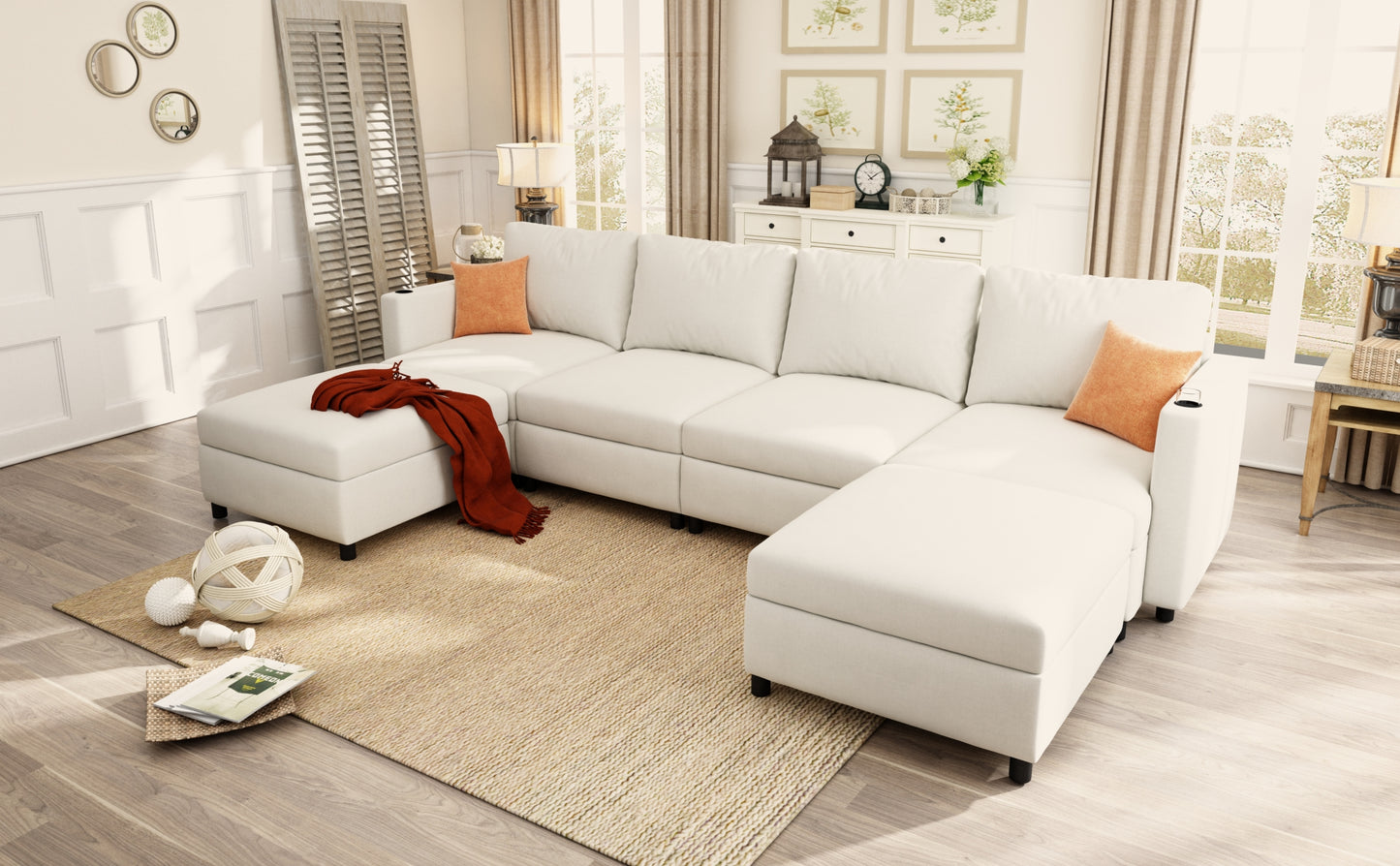 White sectional sofa with chaise lounge and orange accent pillows