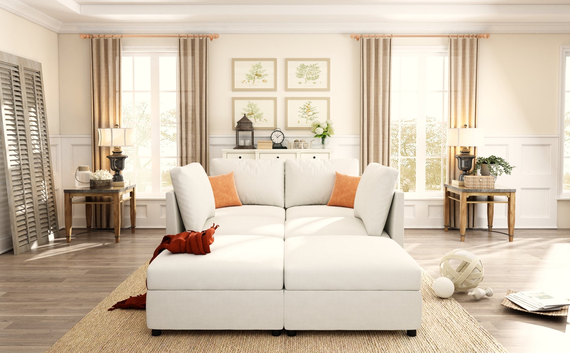 Plush white sectional sofa with orange accent pillows and a rustcolored throw blanket