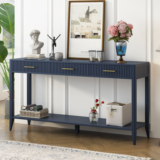 Navy blue fluted console table with brass handles and a lower shelf for storage