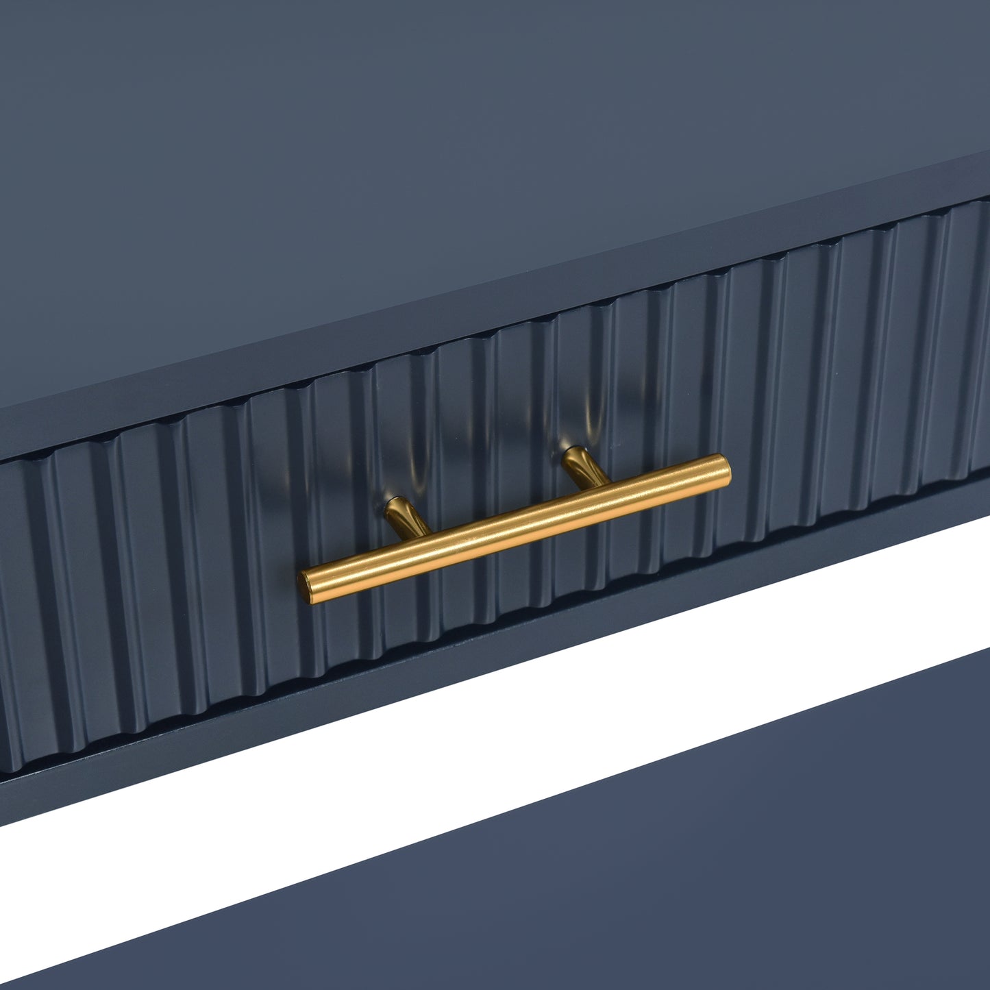 Dark blue ribbed dresser drawer with gold bar pull