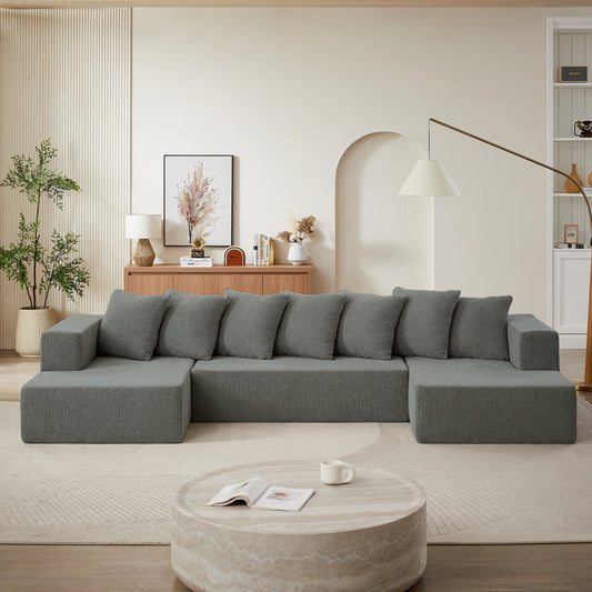 Modern grey sectional sofa with plush cushions perfect for contemporary living rooms