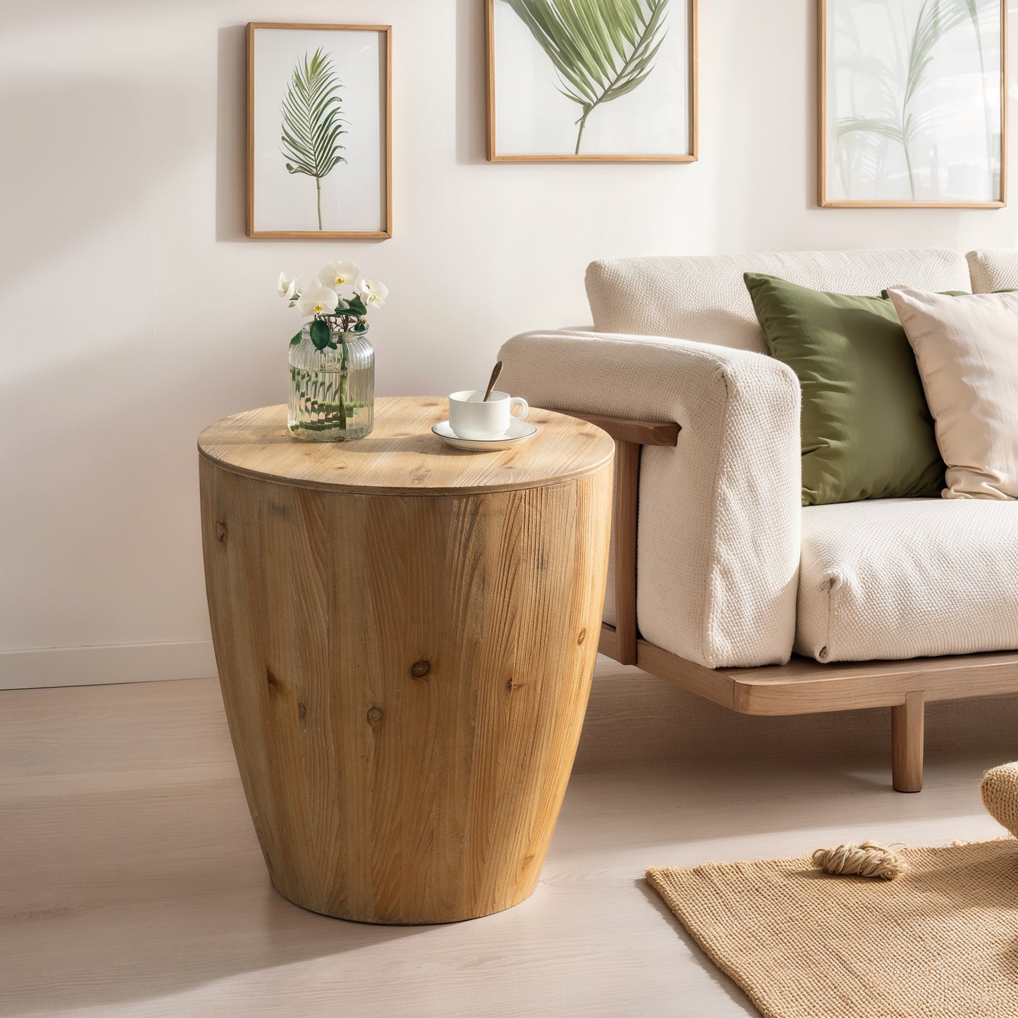 Round natural wood accent table with a subtle barrel shape and textured surface