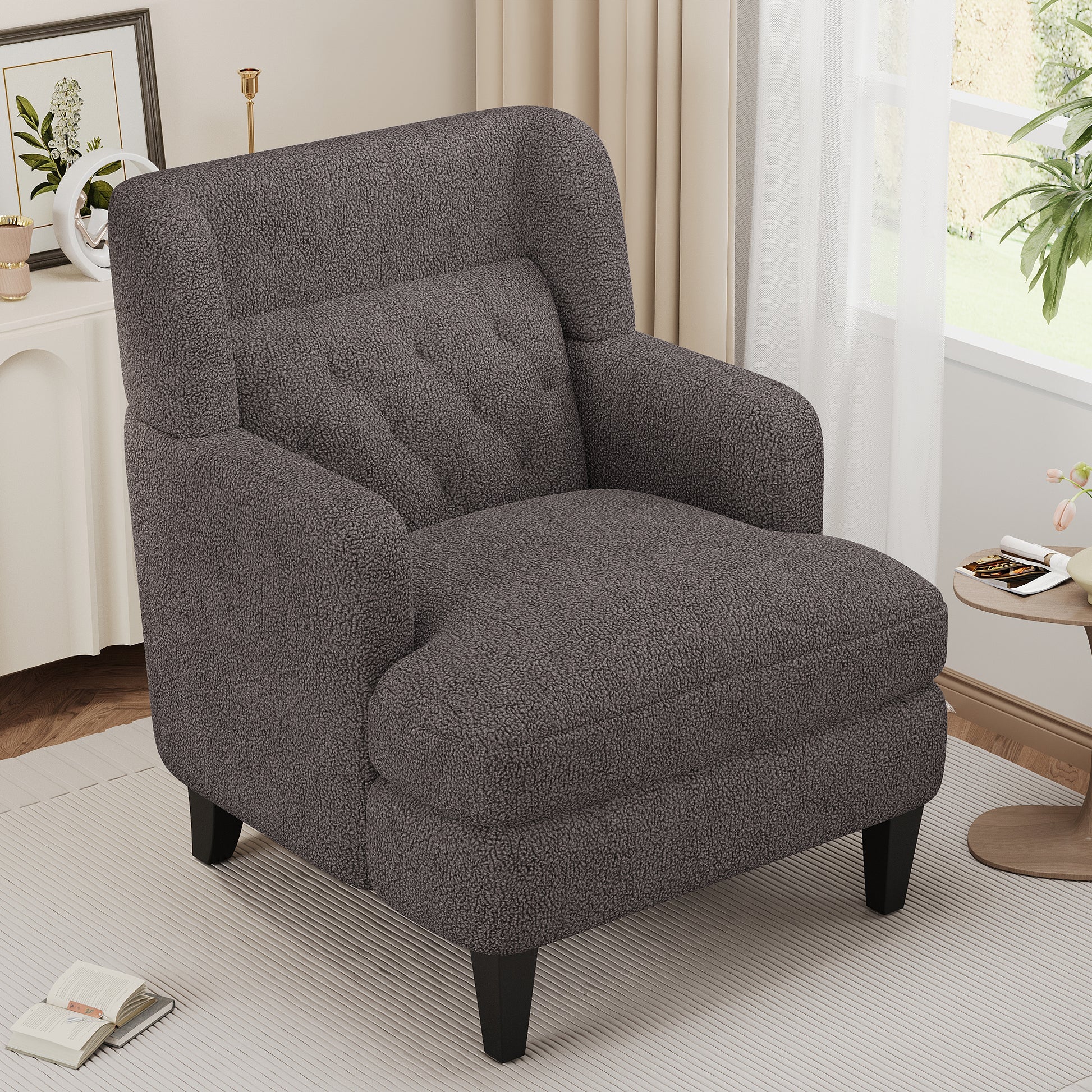 Cozy dark grey boucle armchair with button tufting and plush upholstery for ultimate comfort