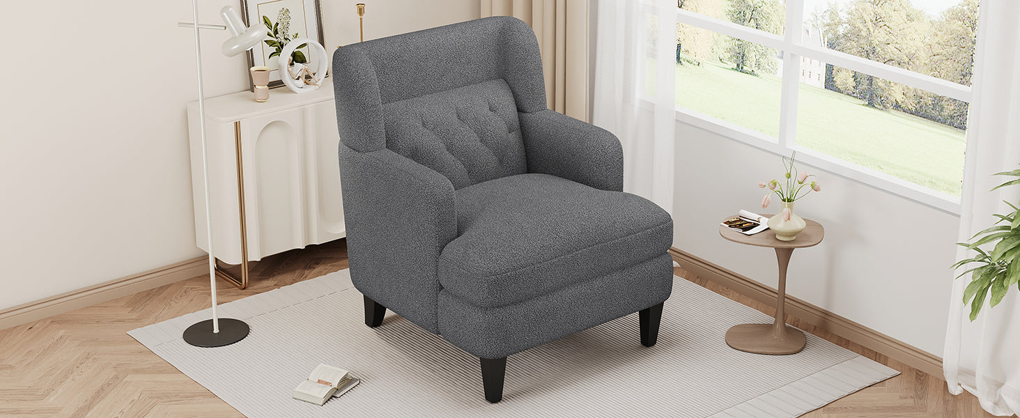 Textured charcoal grey armchair with tufted backrest a cozy accent chair