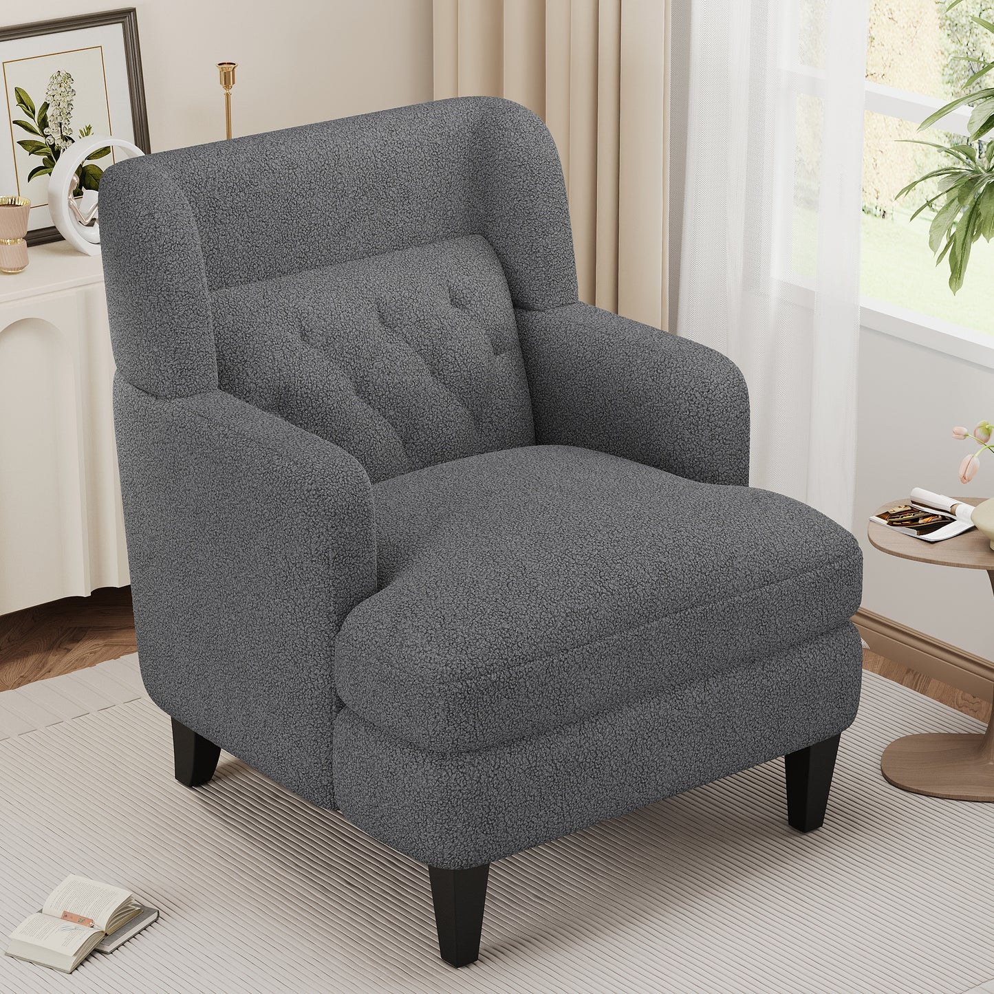 Comfortable charcoal grey armchair with textured boucle upholstery and tufted backrest