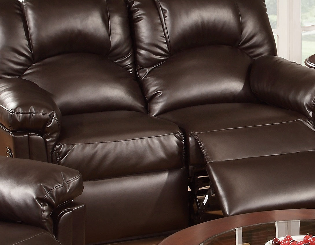 Plush dark brown leather reclining sofa with padded arms and headrests