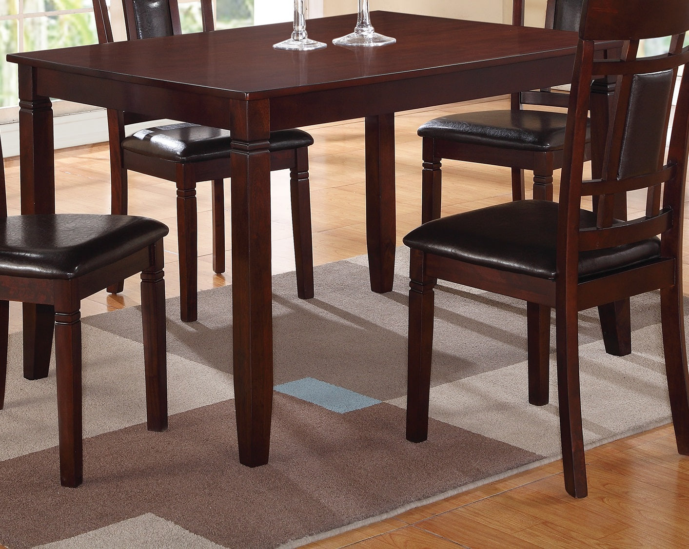Dark wood dining table with four chairs rich espresso finish for elegant dining