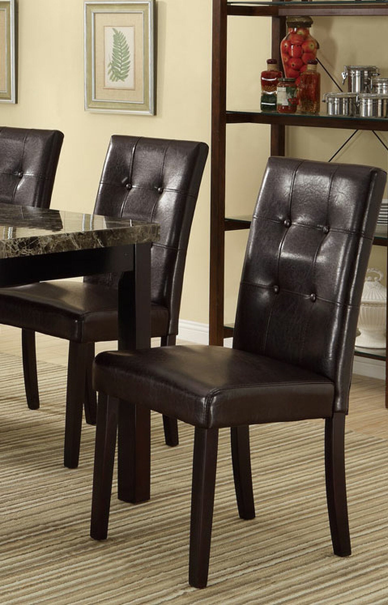 Tufted dark brown faux leather dining chair with dark wood legs
