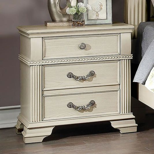 Antique white bedside table with three drawers and decorative hardware