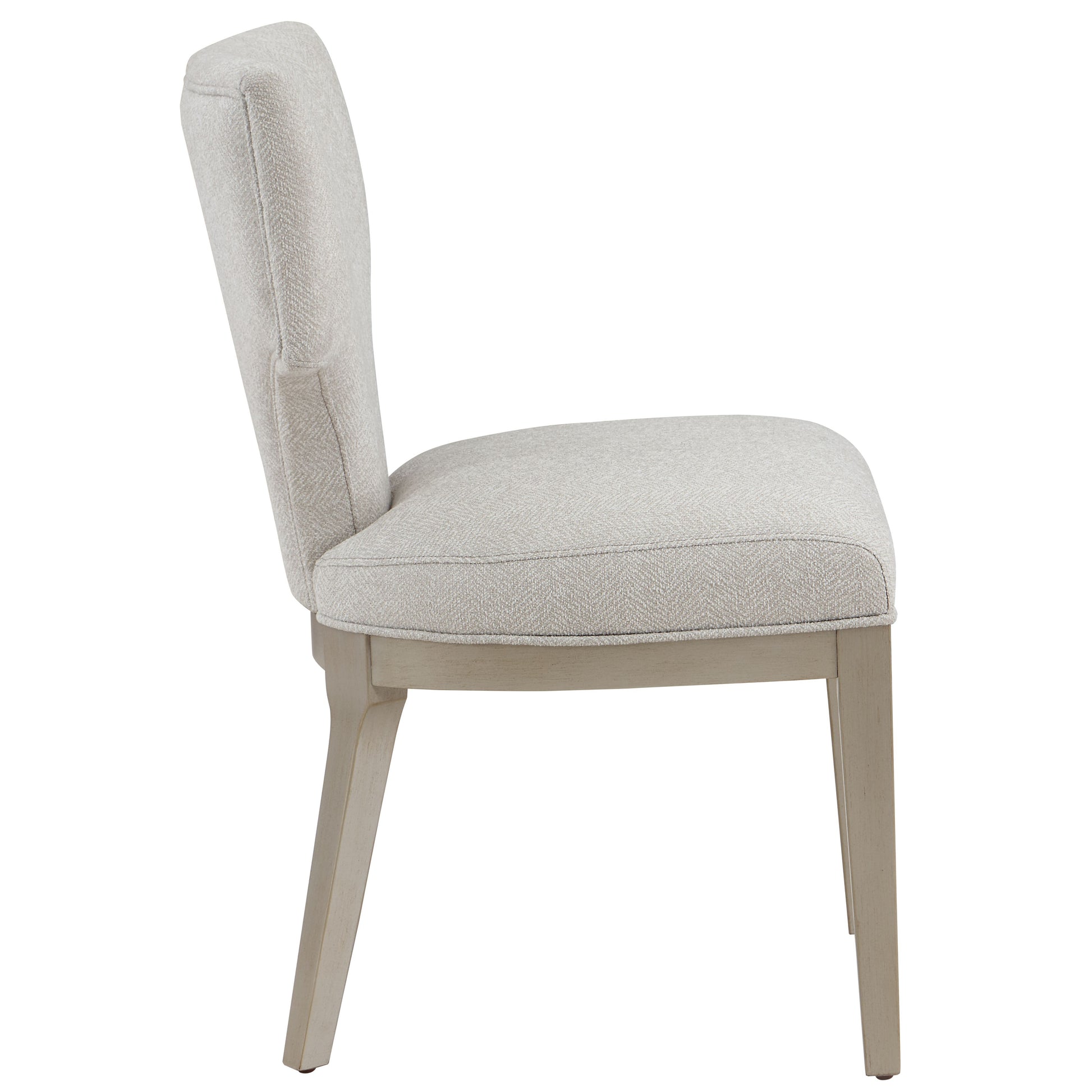 Upholstered dining chair with a light gray textured fabric and a weathered oak wood frame
