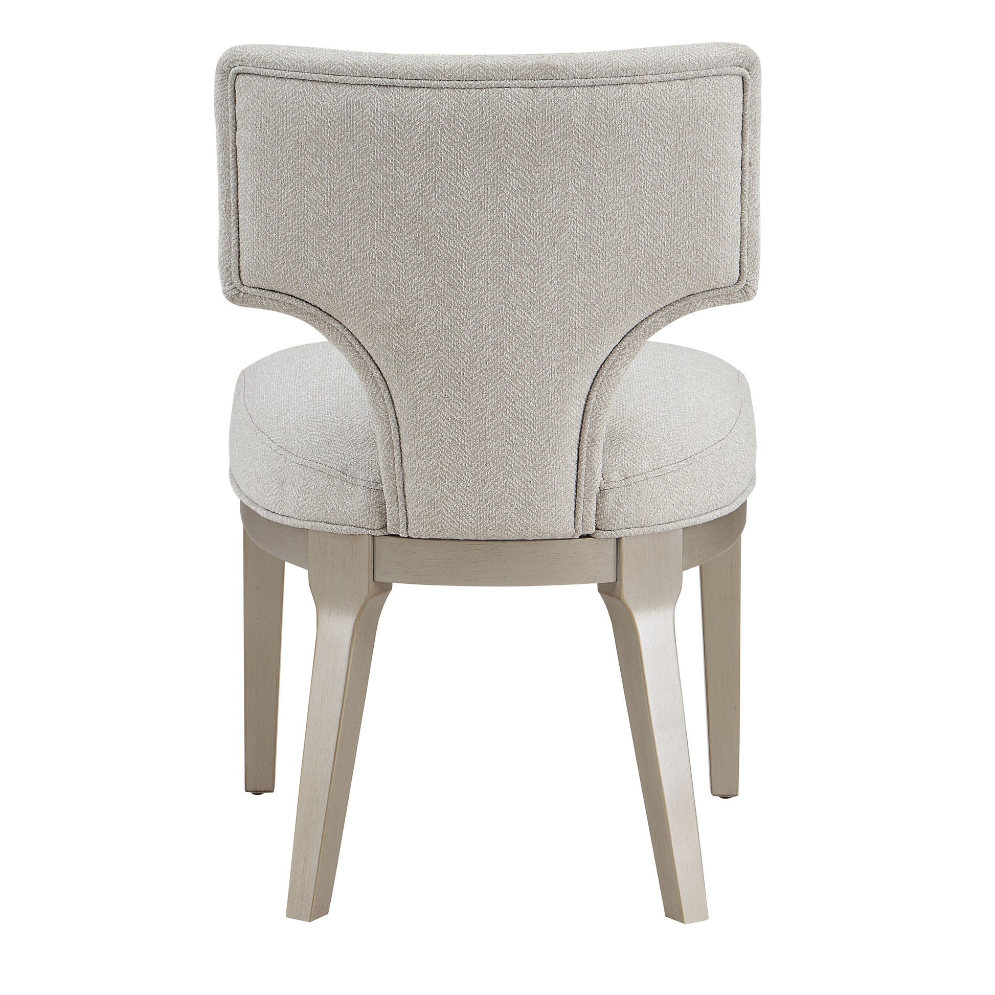 Upholstered accent chair with light grey herringbone fabric and a natural wood finish frame