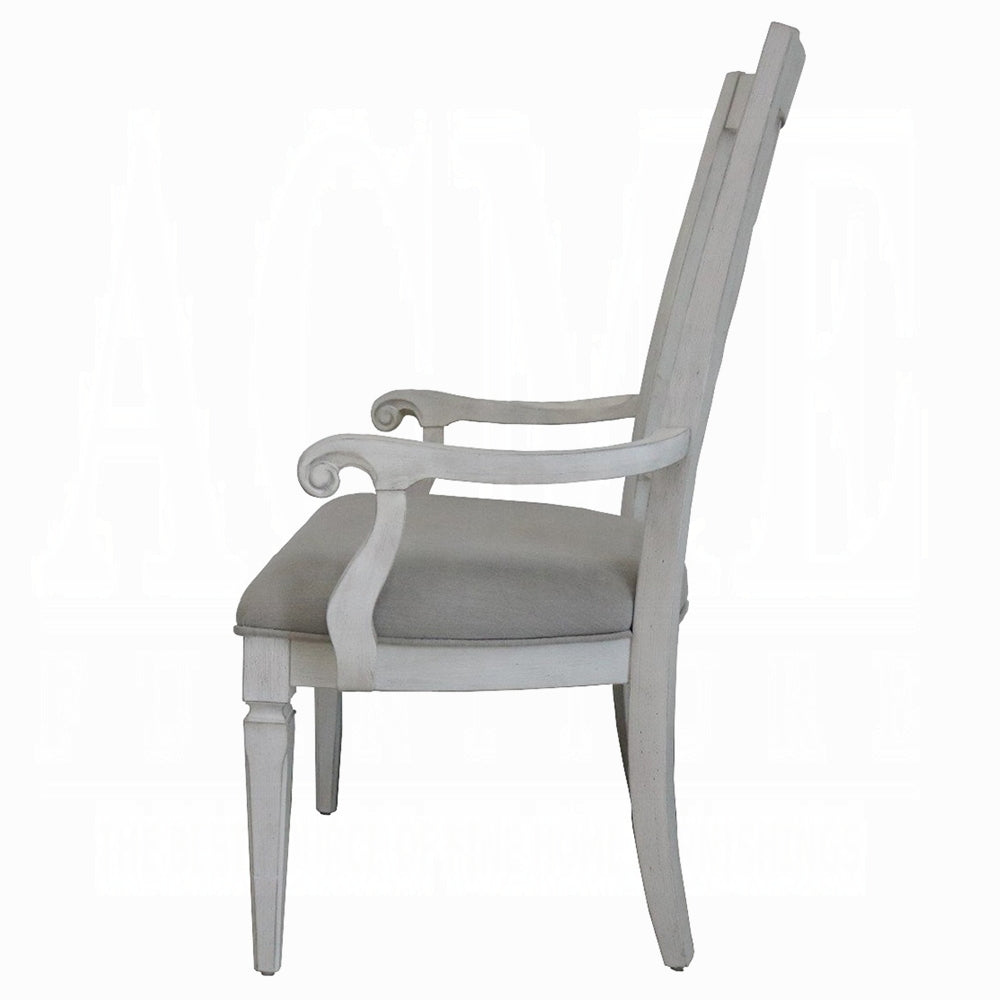 White wooden armchair with upholstered grey seat and elegant curved arms