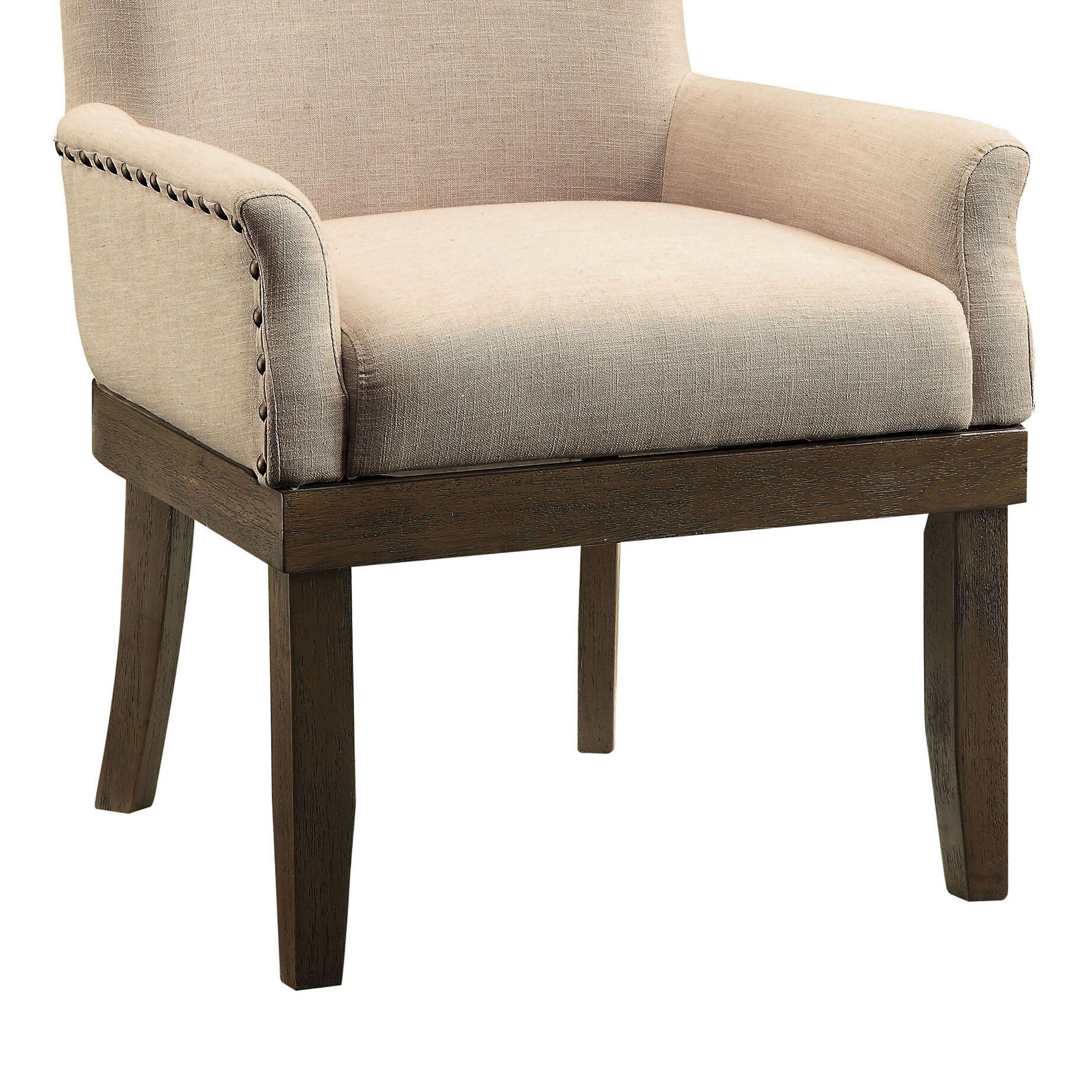 Beige linen upholstered accent chair with decorative nailhead trim and dark wood legs