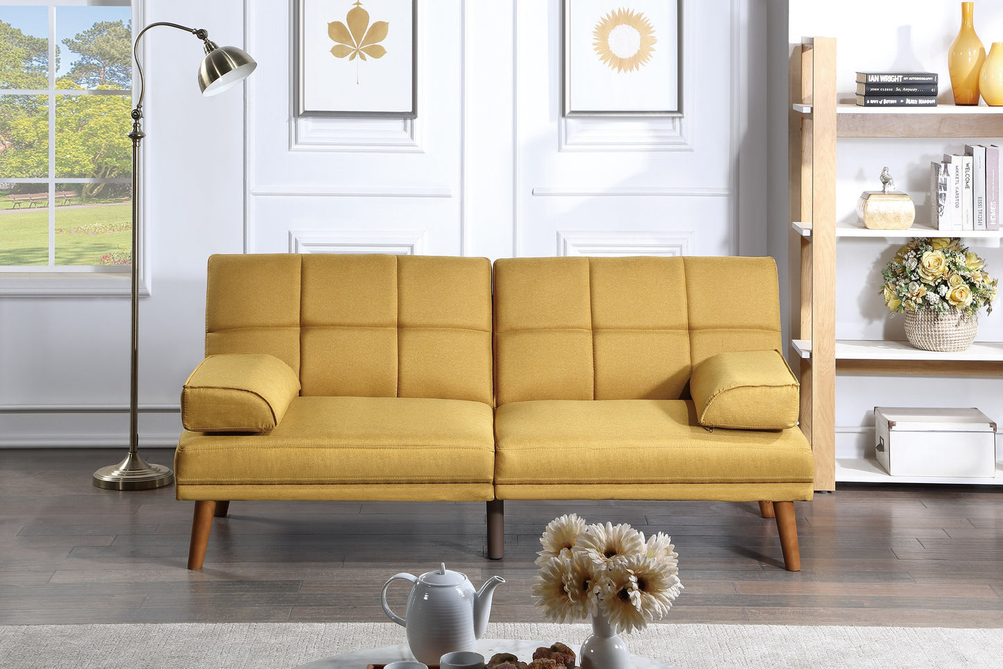 Yellow fabric sofa bed with tufted back cushions and wooden legs perfect for small spaces