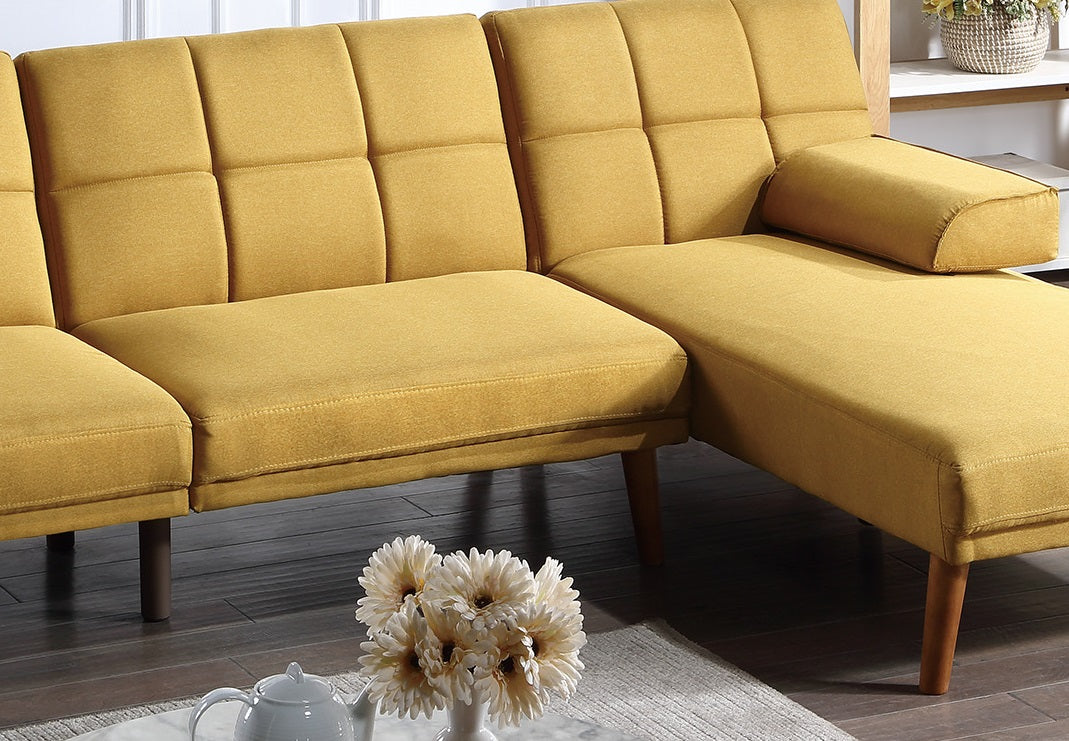Modern mustard yellow linen sectional sofa with tufted back cushions and tapered wooden legs