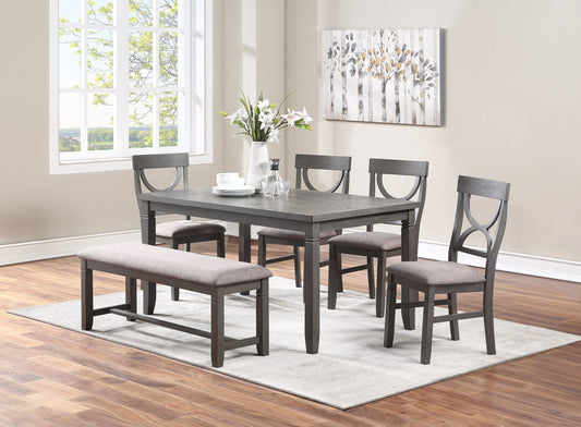 Dark gray dining set with upholstered bench and chairs set for four people
