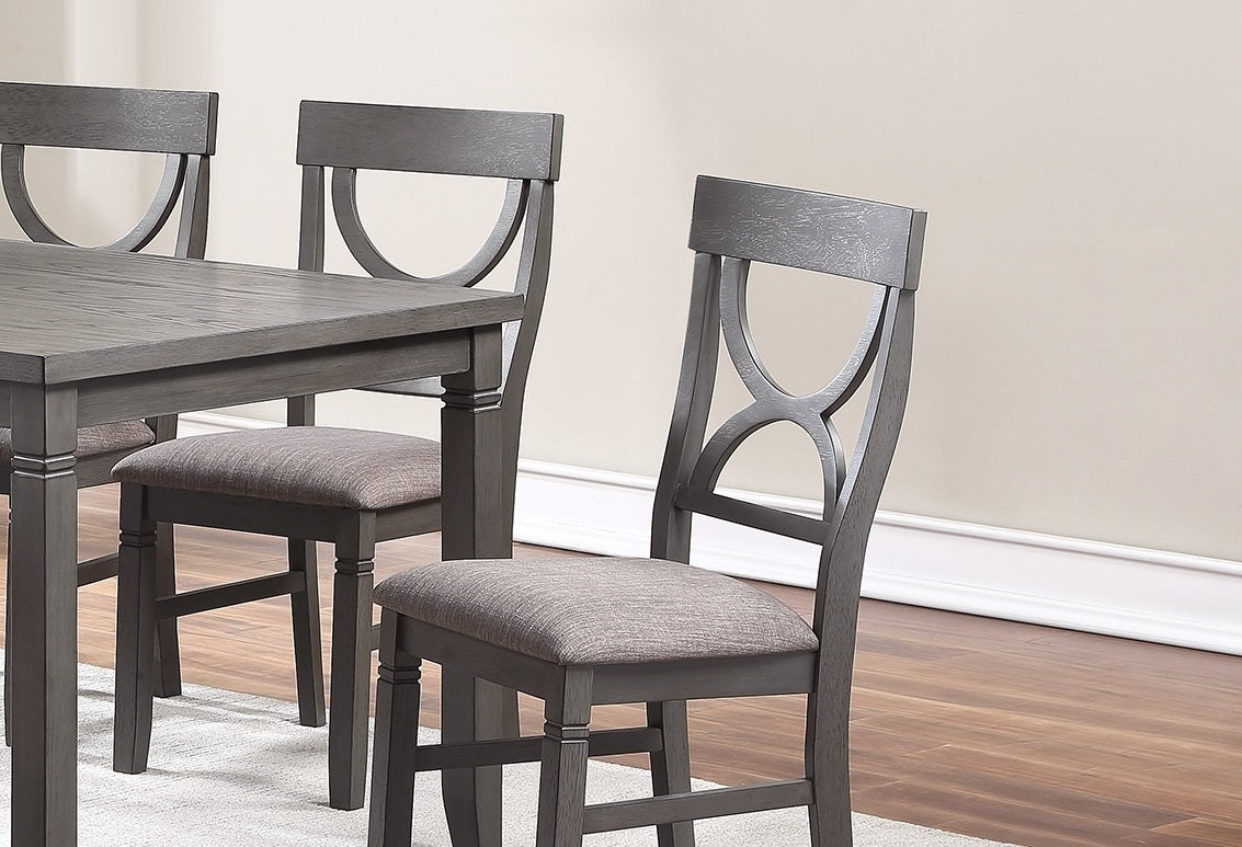 Gray upholstered counter height chairs with arched back detail