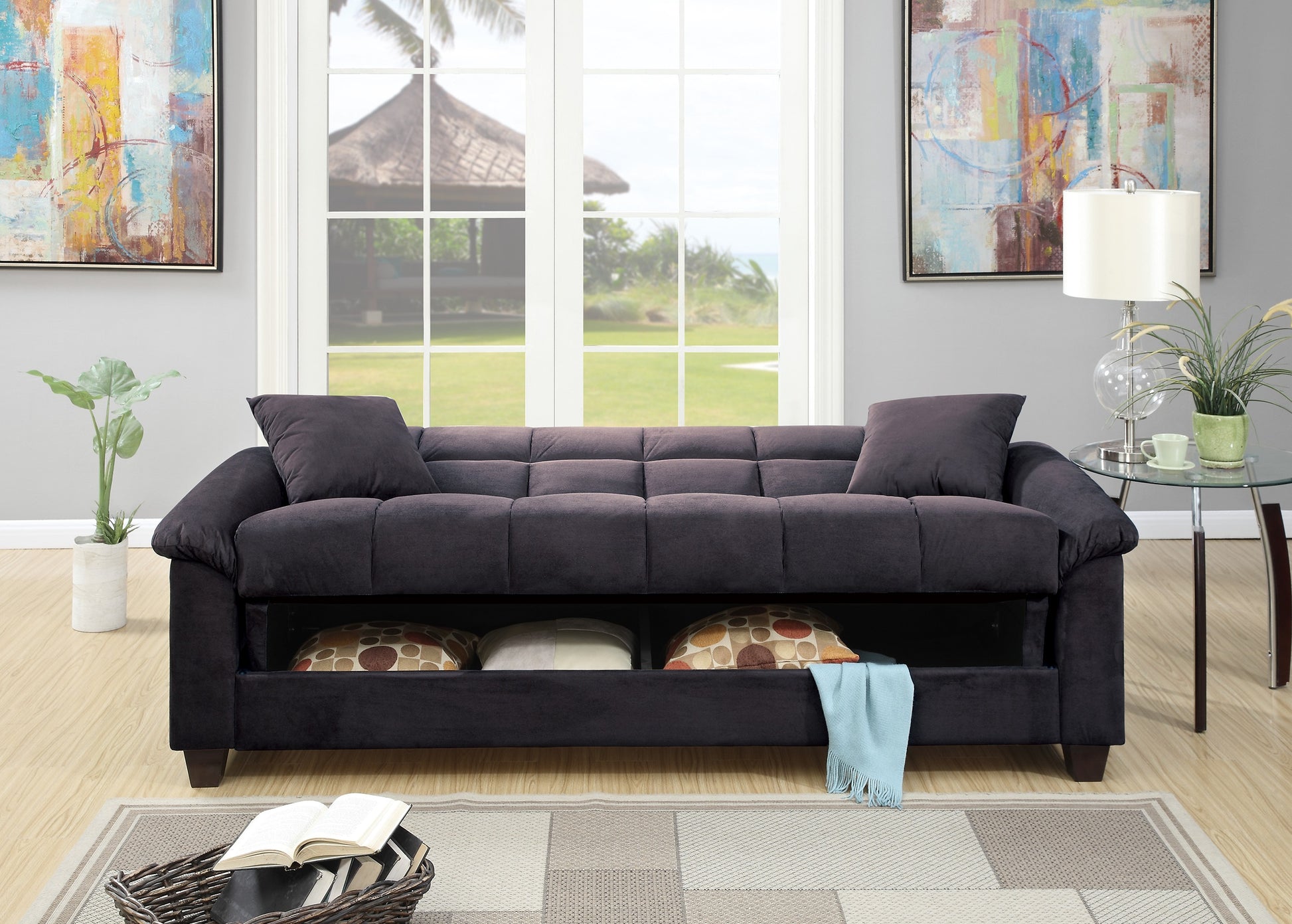 Dark gray velvet sofa with tufted cushions and hidden storage compartments