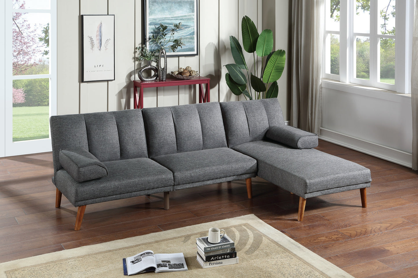 Gray upholstered sectional sofa with tufted back and chaise lounge modern design
