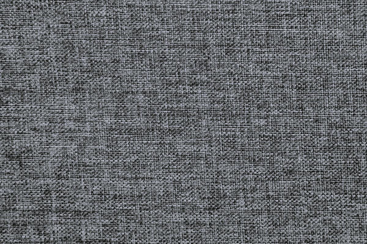 Charcoal grey woven upholstery fabric texture with a heathered appearance ideal for sofas
