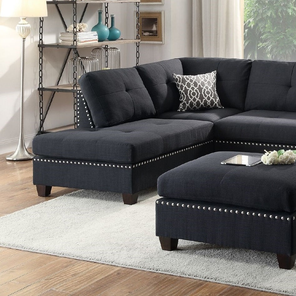Dark gray tufted sectional sofa with silver nailhead trim and chaise Modern living room furniture